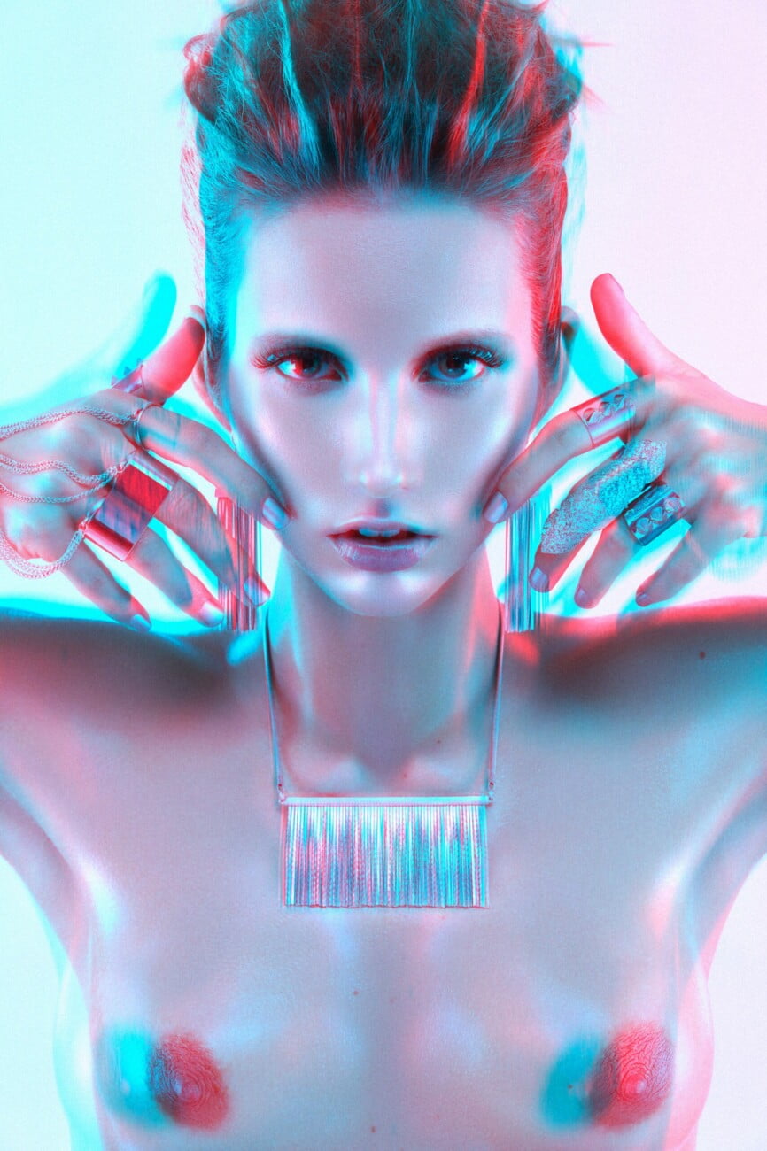 Gorgeous nude make-up by Fanny Maurer accentuates the elegance of model Adeline Petit in an electric blue and red artistic image by photographer Etienne Delorme, featured in Faust Magazine.